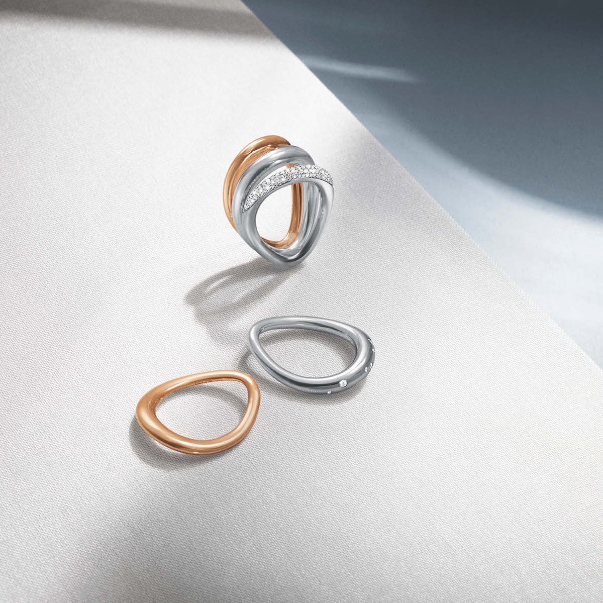 Offspring rings in rose gold and sterling silver with pavé set diamonds 