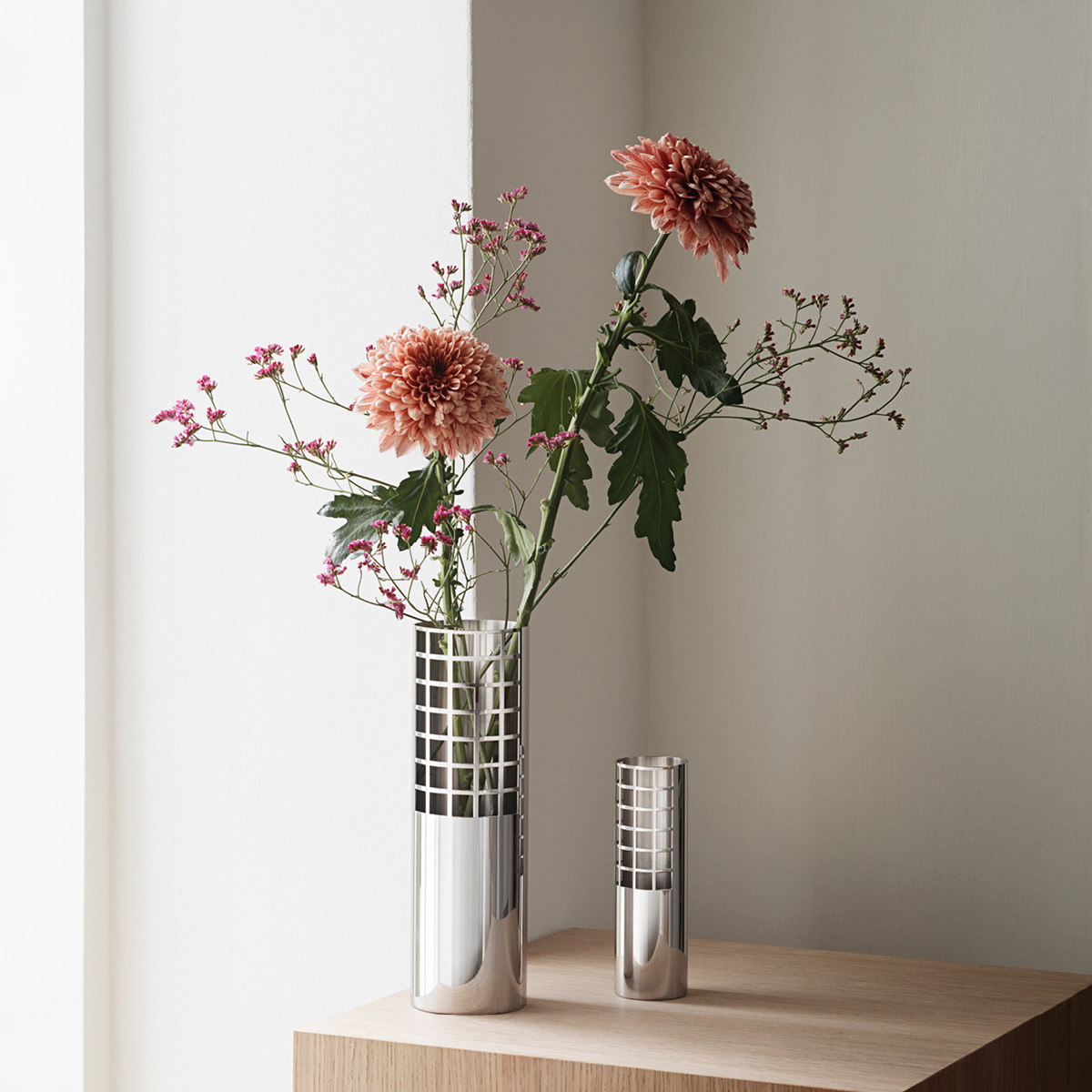 Matrix Tube Vases medium and small in mirror polished stainless steel 