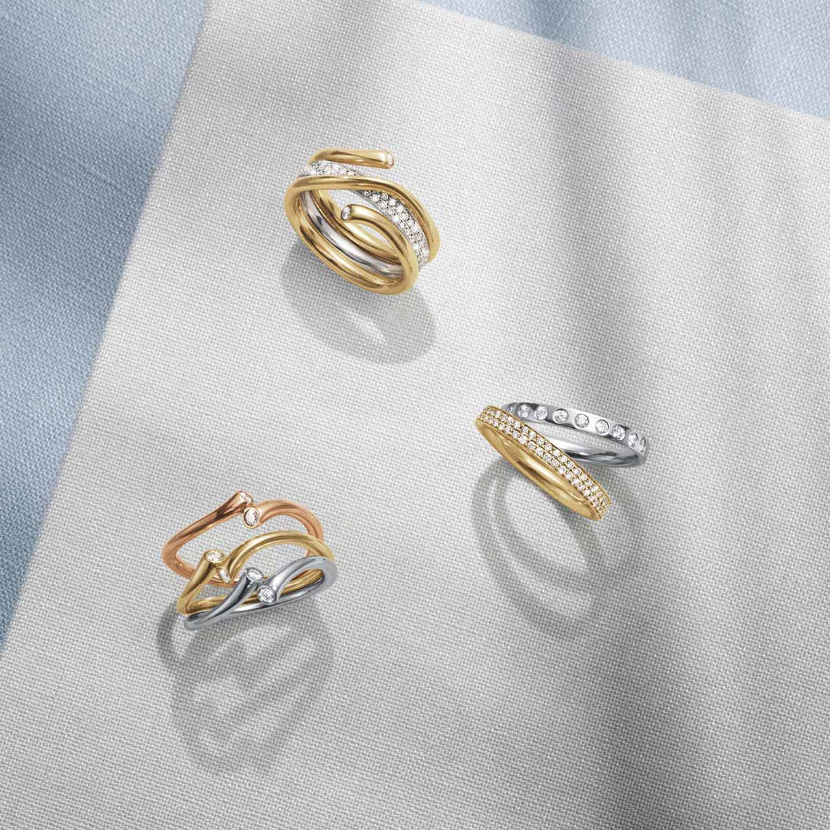 Magic rings in yellow, rose and white gold with brilliant cut diamonds 